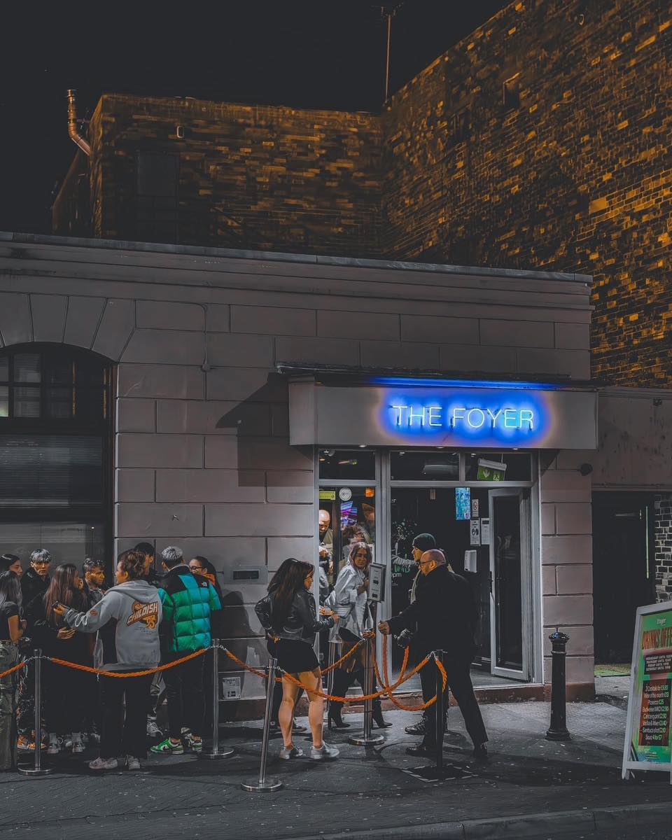 The Foyer entrance on Hassell Street at night